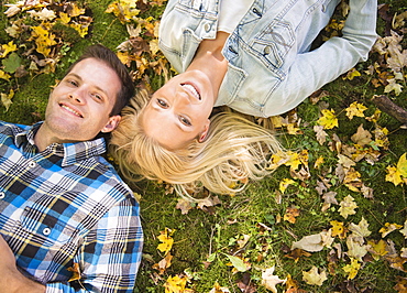 Couple lying on grass, Newtown, Connecticut