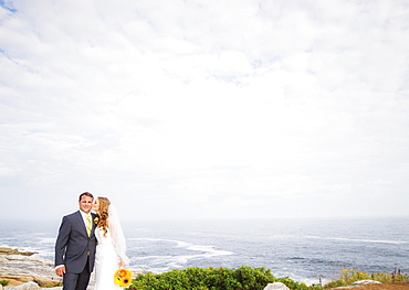 Portrait of married couple, woman kissing man, USA, Maine, Bristol 