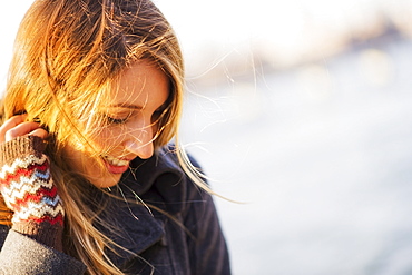 Portrait of woman in sunlight, USA, New York City, Brooklyn, Williamsburg