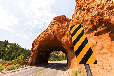 Road going under natural tunnel, USA, Utah, Bryce Canyon