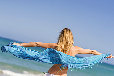 Young woman on beach, Jupiter, Florida, USA