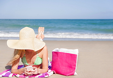 Young woman on beach, Jupiter, Florida, USA