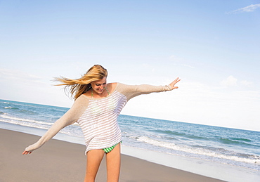 Young woman on beach, Jupiter, Florida, USA