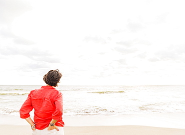 Rear view of woman looking at ocean, Jupiter, Florida