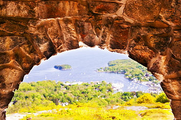 USA, Maine, Camden townscape as seen through stone arch, USA, Maine, Camden