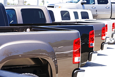 Row of new trucks on lot