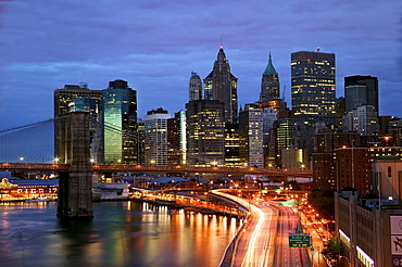 New York City skyline and Brooklyn Bridge at night