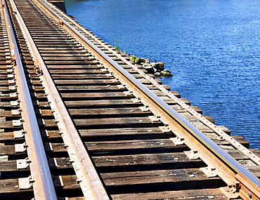 Train tracks at waterâ€™s edge