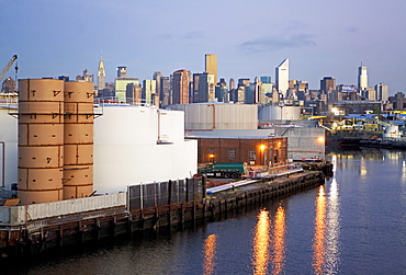 Oil storage tanks with New York City in background