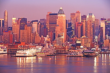 Waterfront buildings at sunset