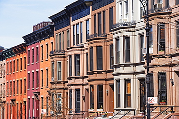 Row of brownstone townhouses