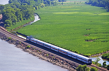 Train beside Hudson River