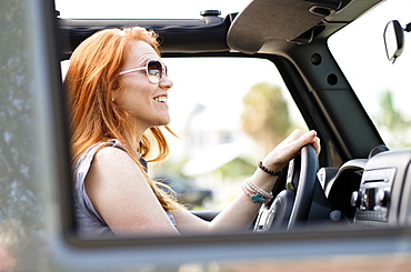 Woman sitting in car