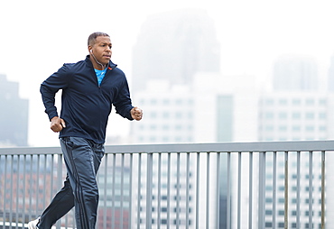 Man running in city