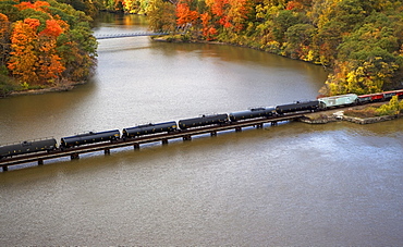 USA, New York, Bear Mountain, aerial view of train crossing lake