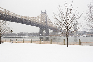 USA, New York City, Queensboro Bridge in winter