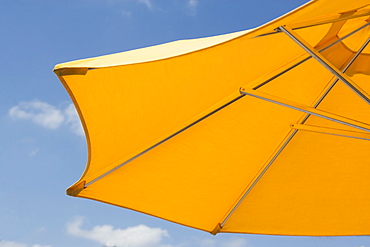 USA, Florida, Miami, Yellow sunshade against blue sky