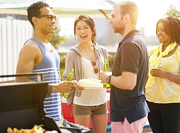 Group of friends enjoying barbeque