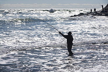 USA, New York, Long Island, Montaurk, Man fishing in sea