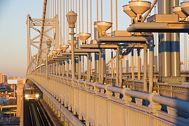 USA, Pennsylvania, Philadelphia, close-up view at Benjamin Franklin Bridge at sunset