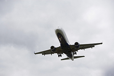 Low angle view of flying airplane