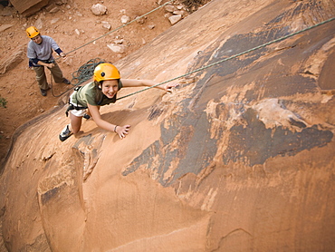 Couple rock climbing