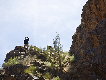 Man standing on cliff