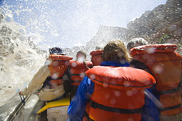 People white water rafting