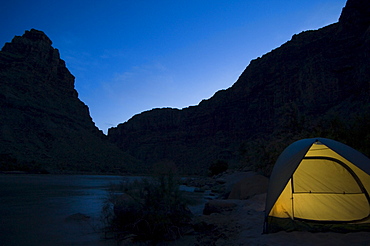 Tent next to river at night, Colorado River, Moab, Utah, United States