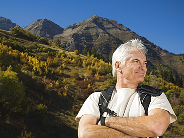 Senior man wearing backpack, Utah, United States