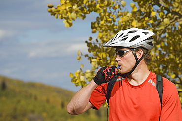 Man wearing bicycle helmet, Utah, United States