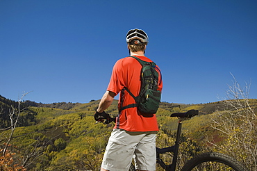 Man with mountain bike, Utah, United States