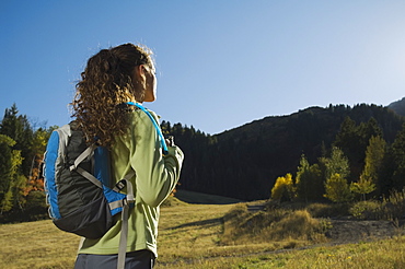 Woman wearing backpack outdoors, Utah, United States