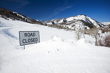 Road Closed sign in snow