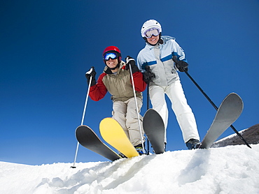 Couple standing on skis