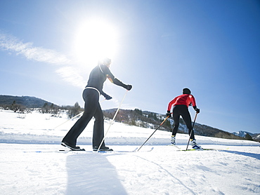 Couple cross country skiing