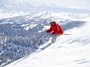 Man skiing downhill