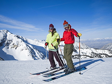 Women standing on skis, Wasatch Mountains, Utah, United States