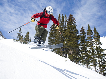 Woman skiing downhill