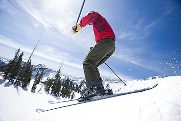 Woman on skis in air