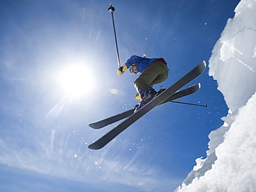 Woman on skis in air