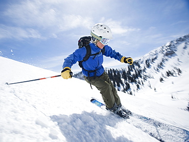 Woman skiing downhill