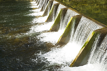 Water pouring over dam, Vancouver, British Columbia, Canada