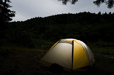 Tent illuminated at night