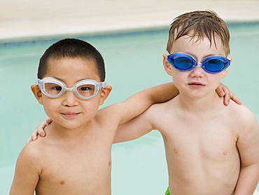 Boys in swim goggles posing