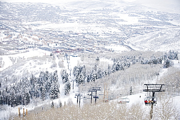 Skiers on a ski lift