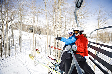 Skiers on a ski lift