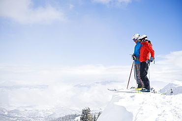 Two downhill skiers