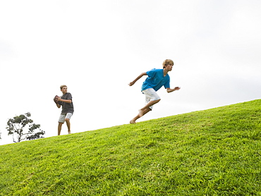 Boys playing football