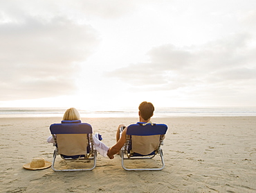 Couple relaxing at the beach